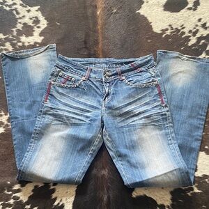 Cowgirl Tuff Women's Light Blue Bootcut Jeans with Red Contrast Stitching -30x35